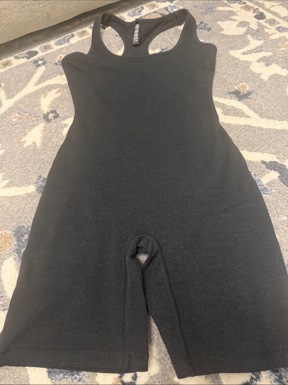 Skims Black Racerback Unitard romper in padded bra attached size S